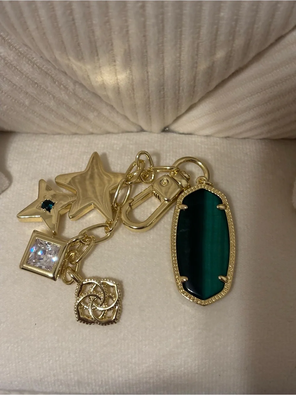 Kendra Scott Gold-Tone Keychain with Emerald Green Oval Pendant and Star Charms